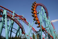 Red roller coaster and big blue sky